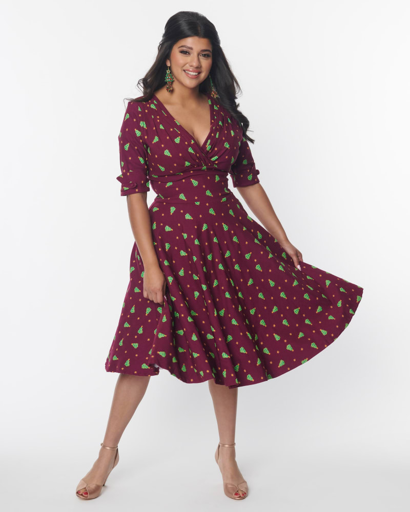 Front of a model wearing a size L Unique Vintage Burgundy & Christmas Tree Delores Swing Dress in Burgundy & Christmas Tree by Unique Vintage. | dia_product_style_image_id:320720